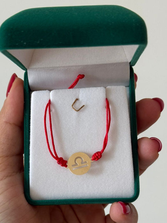 18K Gold . Zodiac thread bracelet in red color